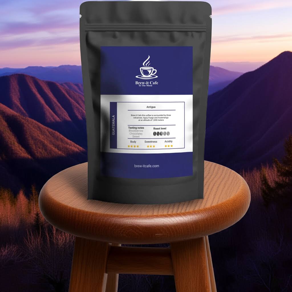 Antigua Coffee Beans by Brew-itCafe displayed on a wooden stool with mountain backdrop, emphasizing premium Guatemalan single-origin quality.