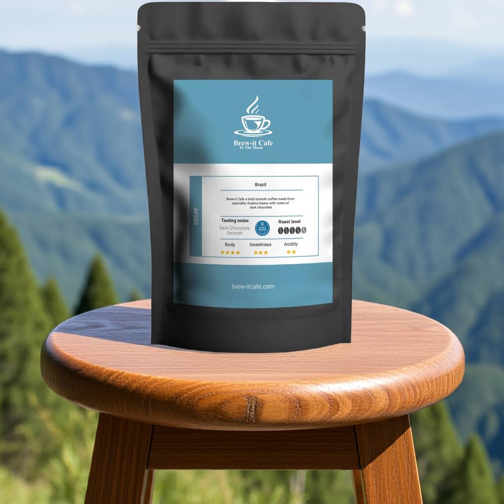Brew-itCafe Decaf Coffee bag displayed on stool with mountain backdrop, promoting chemical-free Swiss-Water Process and rich Brazilian beans.