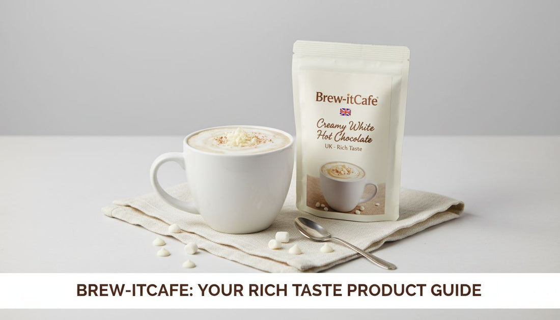 Creamy white hot chocolate in a mug with Brew-itCafe product packaging, white chocolate pieces, and spoon on a neutral background.