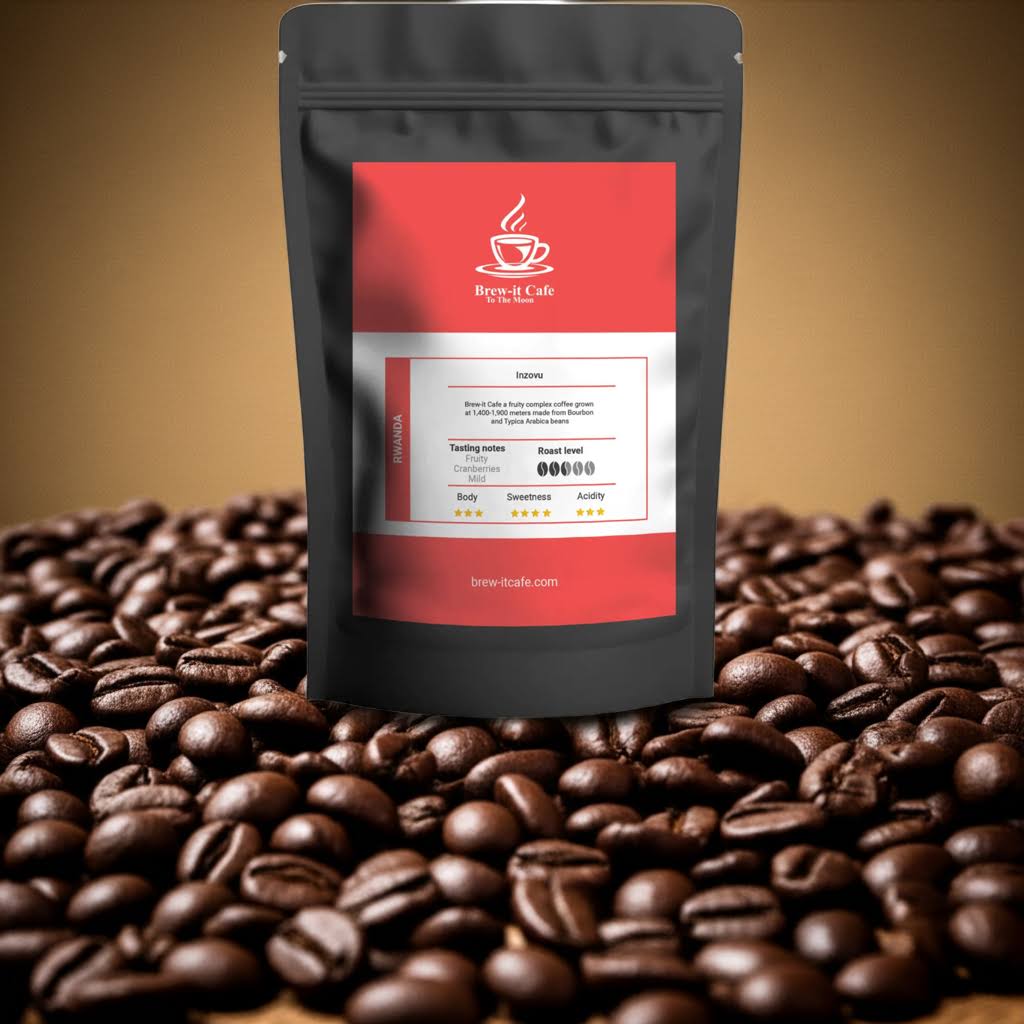 Brew-itCafe Rwanda Single-Origin Coffee Beans pouch placed on roasted coffee beans. Features fruity cranberry notes and mild roast profile.