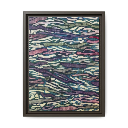 Abstract canvas wall art featuring vibrant colors and flowing designs in a modern frame