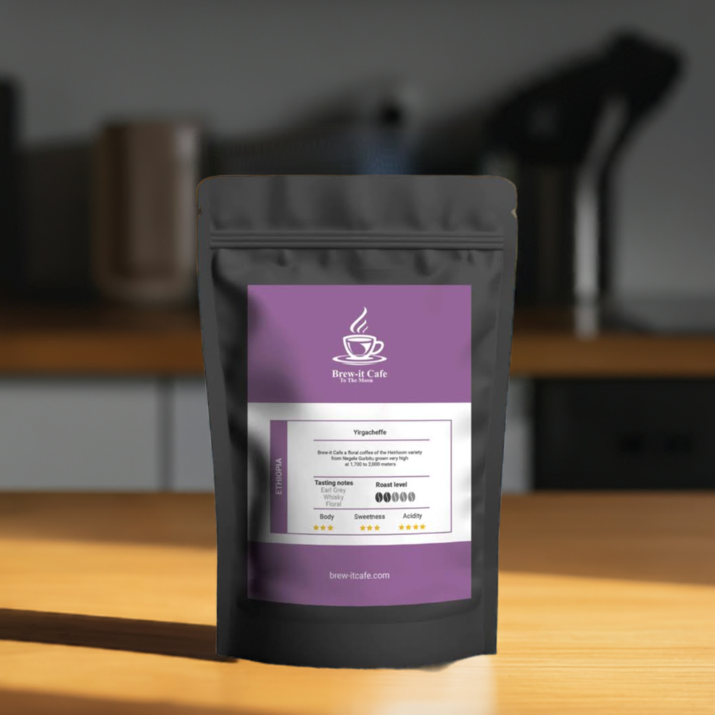 Brew-itCafe single-origin coffee bag with purple label on wooden surface in kitchen setting